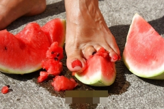Mature feet and watermelon
