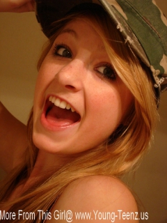 Young American College Teen With Cute Freckles Plays With