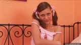 Teen brunette fingering her pussy