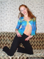 Russian teen redhead shows shaved pussy