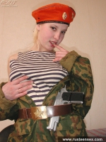 Russian teen in military uniform masturbates with dildo