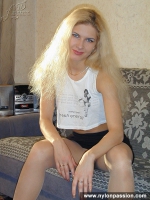 Pantyhose teen blonde posing in the room
