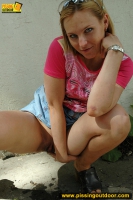 Pissing outdoor near the house