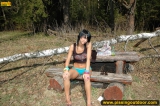 Outdoor pissing in summer forest