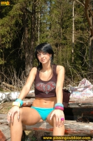 Outdoor pissing in summer forest