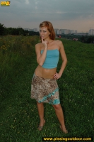 Pissing on a suburban meadow