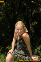 Teen blonde pissing on a tree outdoor