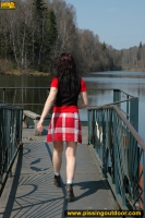 Teen brunette outdoor pissing
