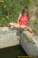 Outdoor pissing to the pool from concrete border