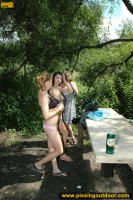 Teen brunette pissing outdoor and walks naked