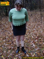 Pissing outdoor on dried leaves on a ground