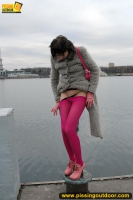 Outdoor pissing on embankment by MILF brunette