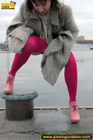 Outdoor pissing on embankment by MILF brunette