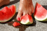 Mature feet and watermelon