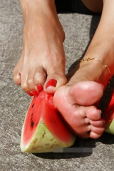 Mature feet and watermelon