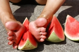 Mature feet and watermelon