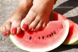 Mature feet and watermelon