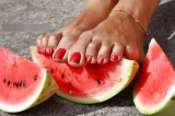 Mature feet and watermelon