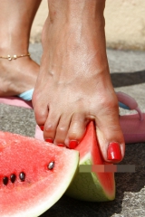 Mature feet and watermelon
