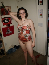 American couple posing to ranch