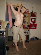 American couple posing to ranch