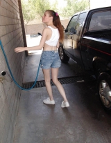 Slim pornstar Melissa flashing boobettes while carwashing