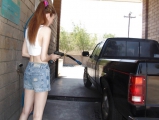 Slim pornstar Melissa flashing boobettes while carwashing