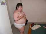 Playing with a big dildo