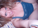 Girl next door rubbing her pussy in bed