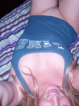 Girl next door rubbing her pussy in bed