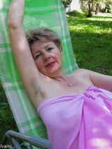 Hairy, busty Ivana in the garden