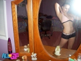 Topless girlfriend does tit