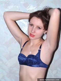 Young longhaired brunette stripping - N
