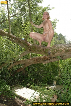 Pissing from a big fallen tree - N