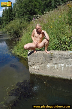 Pissing teen blonde pisses in the pool outdoor - N