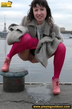 Outdoor pissing on embankment by MILF brunette - N