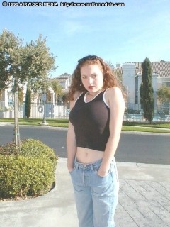 Roller Blading Redhead with Red Lips and Big Tits - N