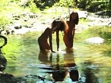 Tanned dark haired babe joins threesome action outdoor