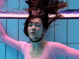 Enjoy Roxalana underwater naked in pool