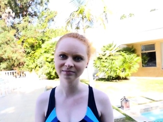 Teen redhead in swimsuit