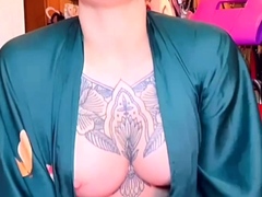 Busty curly brunette with big boobs fucks on couch